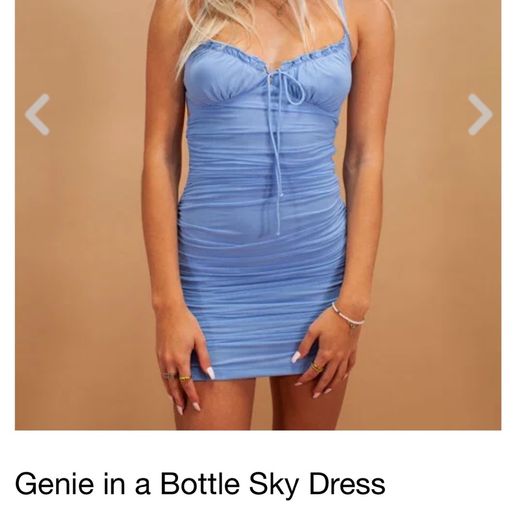 Genie In A Bottle Dress from Isabelle’s Cabinet